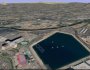 reno1 Aerial view of the Hilton and driving range/lake.
